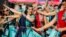 Dancers perform a traditional Indian dance during the Diwali festival of light celebrations, in Trafalgar Square, central London.