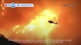 VOA60 America - Wildfires continue burning in Los Angeles as death toll rises to 10