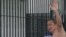 Somyot Prueksakasemsuk, editor of "Voice of the Oppressed," seen here on Jan. 23, 2013, was jailed for 10 years for insulting Thailand's royal family.