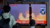 People watch a TV screen showing a news program reporting about North Korea's missiles with file image in Seoul, South Korea, Wednesday, Sept. 15, 2021. North Korea fired two ballistic missiles into waters off its eastern coast Wednesday afternoon,...