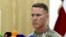 FILE - U.S. Army Col. Ryan Dillon, spokesman for the U.S.-led coalition against the Islamic State group, says the fatal strikes against three drone experts degrade IS's ability "to modify and employ drone platforms as reconnaissance and direct-fire weapons on the battlefield." 