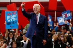 FILE - Democratic presidential candidate Joe Biden speaks during a campaign rally at Renaissance High School in Detroit, March 9, 2020.