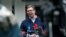 Serbia's President Aleksandar Vucic, addresses the media outside a polling station, in Belgrade, Serbia, Sunday, June 21, 2020.