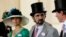 FILE - Jordanian Princess Haya bint Al-Hussein and her husband, Dubai ruler Sheikh Mohammed bin Rashid al-Maktoum, walk to the parade ring on Ladies Day, the third day of horse racing at Royal Ascot, in southern England, June 17, 2010.