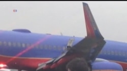 2013-07-23 美國之音視頻新聞: 西南航空客機起落架折斷最少10人受傷