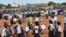 Students and education officials participate in a get-back-to-school campaign launched in Imatong state, South Sudan, June 7, 2017. (D. Silva/VOA) 