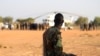 FILE - An armed member of the South Sudanese security forces is seen at the Unity oil fields in South Sudan, Jan. 21, 2019.