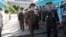 In this photo provided by the South Korea Defense Ministry, North Korean Lt. Gen. An Ik San, center, crosses to southern side for the meeting with South Korea at the border village of Panmunjom, South Korea, July 31, 2018. 