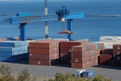 FILE - Shipping containers are seen in the Black Sea port of Odessa, Ukraine, Nov. 4, 2016.