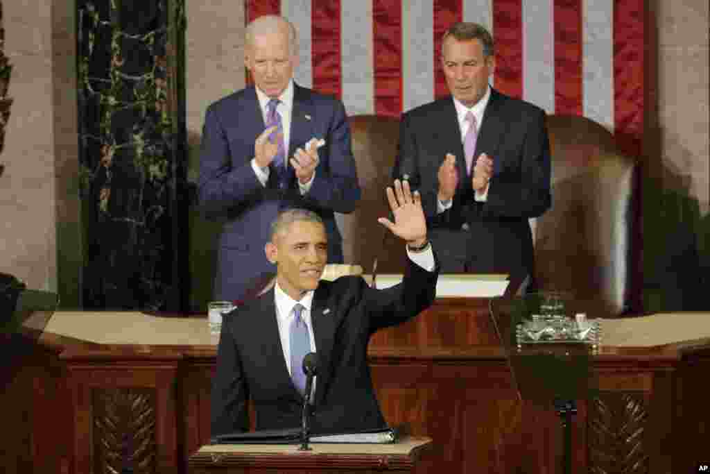 President Barack Obama waves before giving his State of the Union address before a joint session of Congress on Capitol Hill in Washington, Jan. 20, 2015.