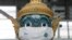 A Thai traditional giant statue wears a protective mask, amid the coronavirus disease (COVID-19) pandemic, at Suvarnabhumi Airport in Bangkok, Thailand Dec. 15, 2020.