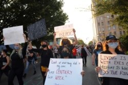 People march for the third day since the release of the grand jury report on the death of Breonna Taylor on Sept. 26, 2020 in Louisville, Kentucky.