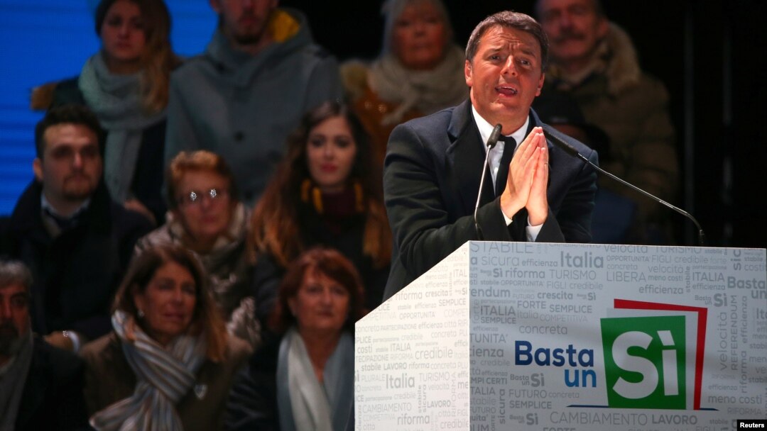 Italian Prime Minister Matteo Renzi speaks during the last rally for a "Yes" vote in the upcoming referendum about constitutional reform, in Florence, Italy, Dec. 2, 2016.