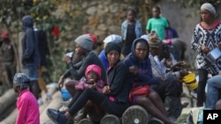 People displaced by armed gang attacks take refuge in the town hall of the Kenscoff neighborhood of Port-au-Prince, Haiti, Feb. 13, 2025. 