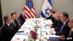 FILE - US Secretary of State Antony Blinken (L) meets with Israel's Foreign Minister Israel Katz (2nd-R) in Tel Aviv on January 9, 2024, during his week-long trip aimed at calming tensions across the Middle East, amid continuing battles between Israel and Hamas in Gaza.