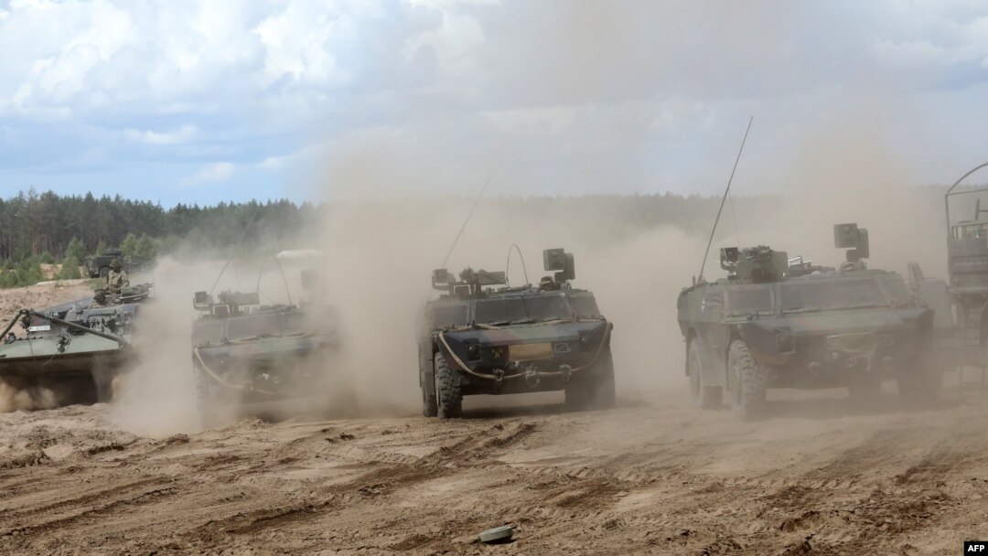 FILE - Tentara mengambil bagian dalam latihan militer bilateral Lituania-Jerman 'Griffin Storm' di Area Pelatihan Jenderal Silvestras Zukauskas di Pabrade, Lituania pada 26 Juni 2023. (PETRAS MALUKAS/AFP)