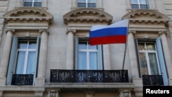 The Russian flag flies on the Consulate-General of the Russian Federation in Manhattan in New York City, March 26, 2018. 