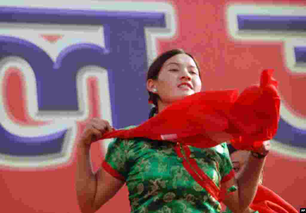 A dancer on stage at the Maoists May Day rally