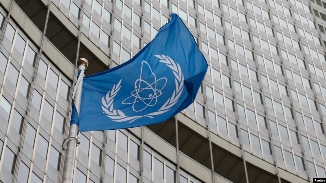 FILE - The flag of the International Atomic Energy Agency (IAEA) flies in front of its headquarters in Vienna, Austria, Jan.15, 2016. 