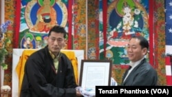 Kunga Thinley (left) and Lobsang Nyandak (right)