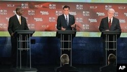 From left, GOP presidential frontrunners: Herman Cain, left, Mitt Romney, center, and Newt Gingrich, Spartanburg, S.C., Nov. 12, 2011.