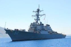 In this file picture downloaded from the US Navy website, taken on April 29, 2013, the guided-missile destroyer USS Barry arrives in Souda Bay, Greece.