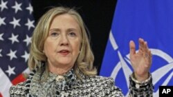 U.S. Secretary of State Hillary Clinton speaks at a news conference at the Alliance headquarters in Brussels, April 18, 2012.