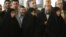 Female nominees, Susan Keshavarz as education minister, left, Marzieh Vahid Dastgerdi as health minister, center, and Fatemeh Ajorlu as welfare and social security minister, stand in a press briefing by Iranian President Mahmoud Ahmadinejad and parliament