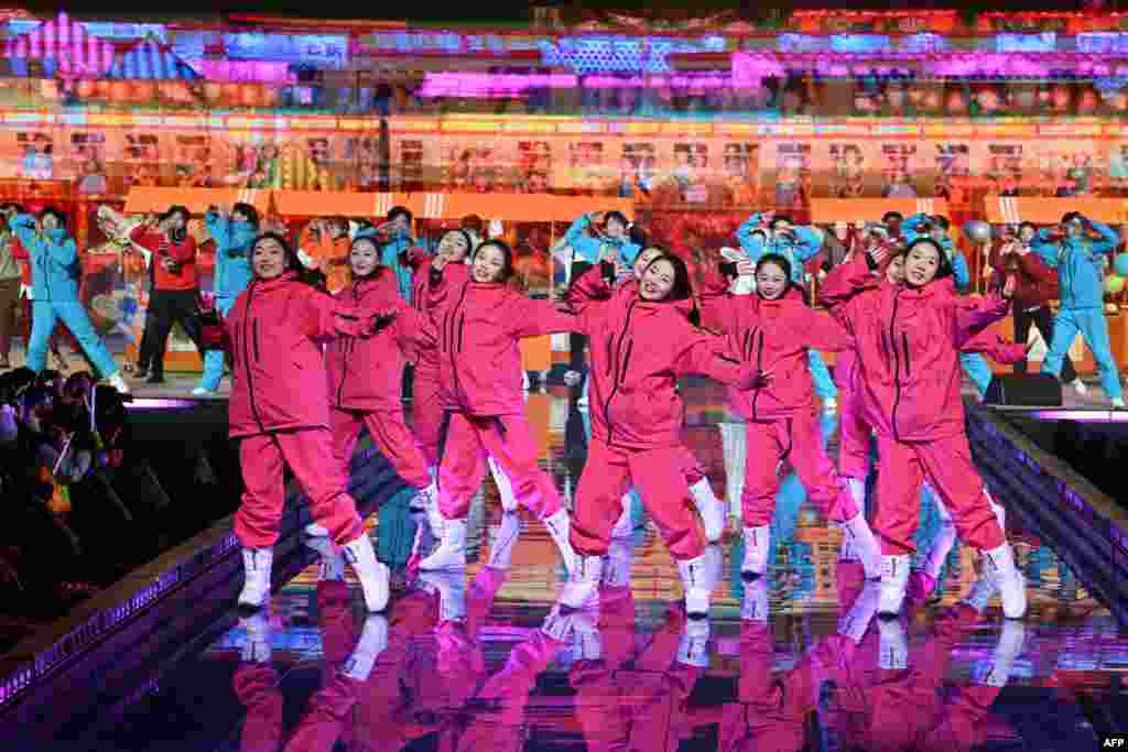 Dancers perform during the New Year's countdown celebrations in Beijing, China, Jan. 1, 2025. 