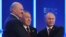 Russian President Vladimir Putin (R), Kazakh President Nursultan Nazarbayev (C) and Belarus President Alexander Lukashenko shake hands during a meeting of the Eurasian Economic Union in Astana, Kazakhstan, May 29, 2014.