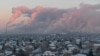 Steam rises from chimneys of the Gazprom Neft's oil refinery in Omsk, Russia November 18, 2022. (REUTERS/Alexey Malgavko)