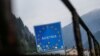 FILE PHOTO: A street sign reading "Austria" is pictured in the Italian village of Brenner on the Italian-Austrian border