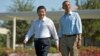 President Barack Obama and Chinese President Xi Jinping, left, walk at the Annenberg Retreat of the Sunnylands estate, June 8, 2013, in Rancho Mirage, Calif.