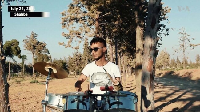 Syrian Kurd Who Lost Hand, Eye to IS Finds Passion for the Drums 