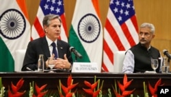 U.S. Secretary of State Antony Blinken, left, speaks as Indian Foreign Minister Subrahmanyam Jaishankar listens during a joint news conference at Jawaharlal Nehru Bhawan (JNB) in New Delhi, India, July 28, 2021. 