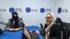 FILE - Station director Saba Chaman, right, and her colleague work in a studio at Radio Begum in Kabul, Afghanistan, Nov. 28, 2021.