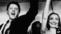 FILE - Former Arkansas Gov. Bill Clinton and his wife Hillary celebrate his victory in the Democratic runoff in Little Rock, Ark., June 8, 1982.