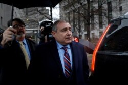 FILE - Lev Parnas, associate of President Donald Trump's personal lawyer Rudy Giuliani, exits after a bail hearing at the Manhattan Federal Court in New York, Dec. 17, 2019.