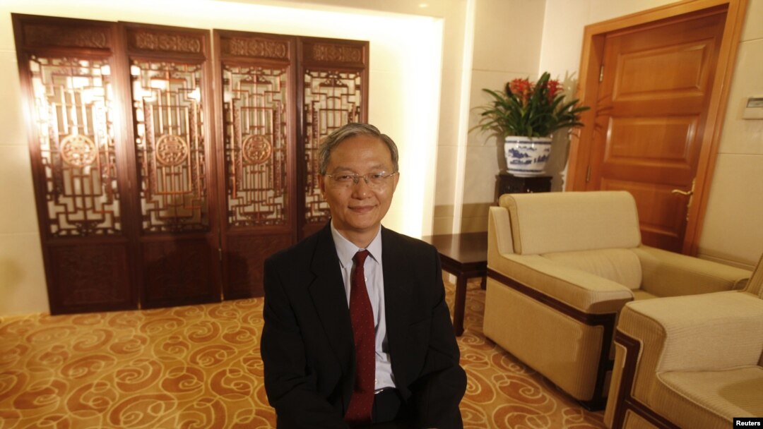 FILE - Zhong Jianhua, China's special Envoy to Africa, poses for a photograph during an interview with Reuters at the Ministry of Foreign Affairs in Beijing.