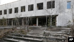 Houses in the deserted town of Pripyat, some 3 kilometers from the Chernobyl nuclear power plant in Ukraine. 