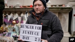 Richard Ratcliffe, the husband of Iranian detainee Nazanin Zaghari-Ratcliffe, ends his hunger strike at 21 days in London, Saturday, Nov. 13, 2021.