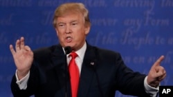 FILE - Then-Republican presidential nominee Donald Trump speaks during the third presidential debate at UNLV in Las Vegas, Nevada, Oct. 19, 2016.