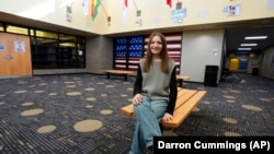 Makenzie Gilkison sits in the lobby at Greenfield Central High School, Tuesday, December 17, 2024, in Greenfield, Indiana.