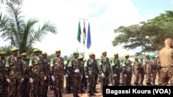 Les éléments de la MISCA, la force de l’Union Africaine en Centrafrique lors de la cérémonie leur rendant hommage le 13 septembre 2014 au camp Mpoko de Bangui, RCA.