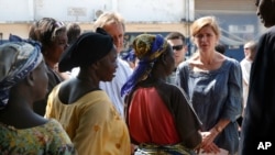 U.S. Ambassador to the United Nations Samantha Power speaks to IDP women at the makeshift camp where over 40,000 found refuge at the airport in Bangui, Central African Republic, Dec. 19, 2013.