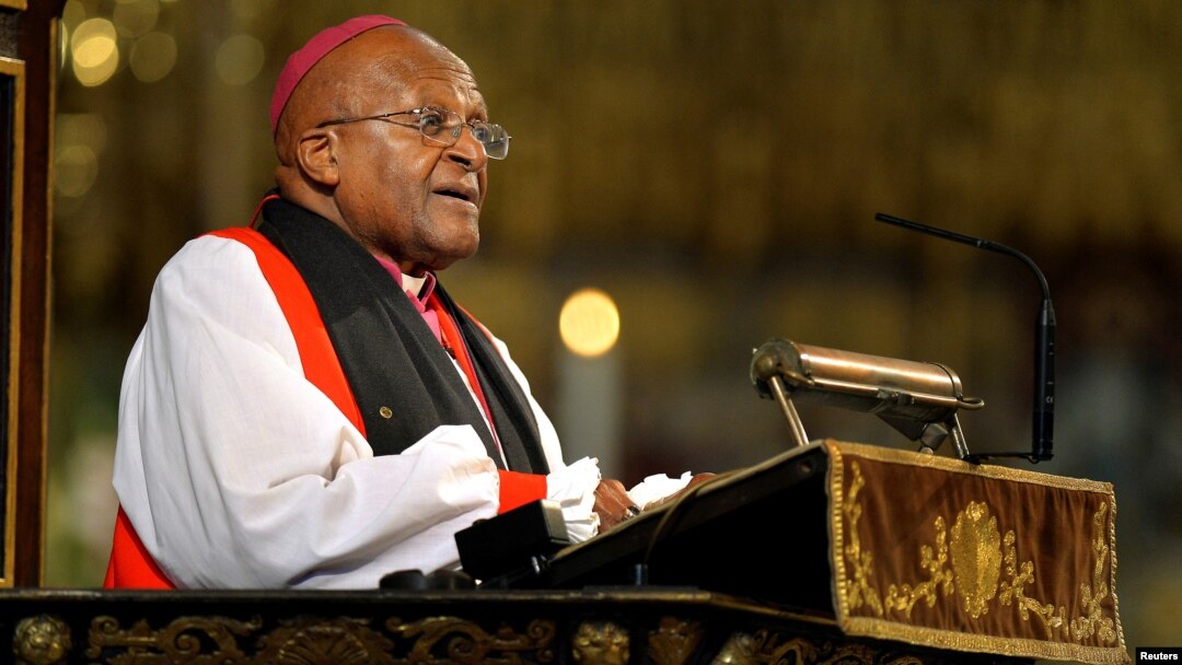 FILE - Archbishop Desmond Tutu speaks during a memorial service for former South African President Nelson Mandela at Westminster Abbey in London, March 3, 2014. (John Stillwell/Pool/Reuters)