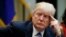 FILE - President Donald Trump listens during a meeting at the White House, March 27, 2017.