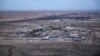 FILE - An aerial photo taken from a helicopter shows al-Asad Air Base in the western Anbar desert, Iraq, Dec. 29, 2019. It was one of the sites where U.S. forces have been attacked with drones or rockets in October 2023. 