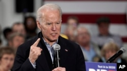 Democratic presidential candidate Joe Biden gestures as he speaks during a campaign stop in Council Bluffs, Iowa, Jan. 29, 2020.