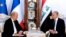 Iraqi Foreign Minister Mohammed Ali al-Hakim (R) meets his French counterpart Jean-Yves Le Drian in Baghdad on October 17, 2019. - France's top diplomat held talks in Baghdad about transferring foreign jihadists from northern Syria, where a Turkish…